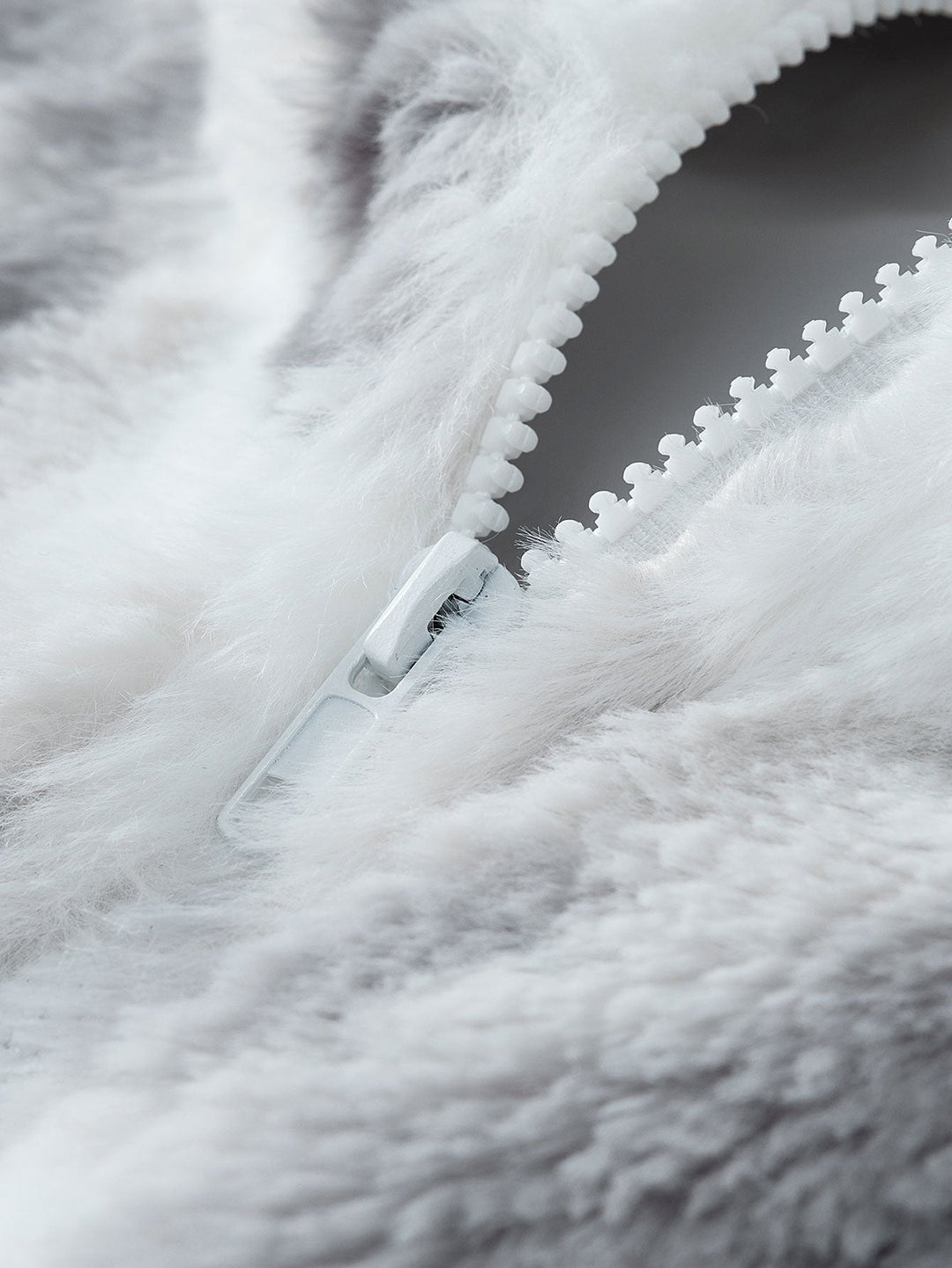 Faux fur coat with zipper closure
